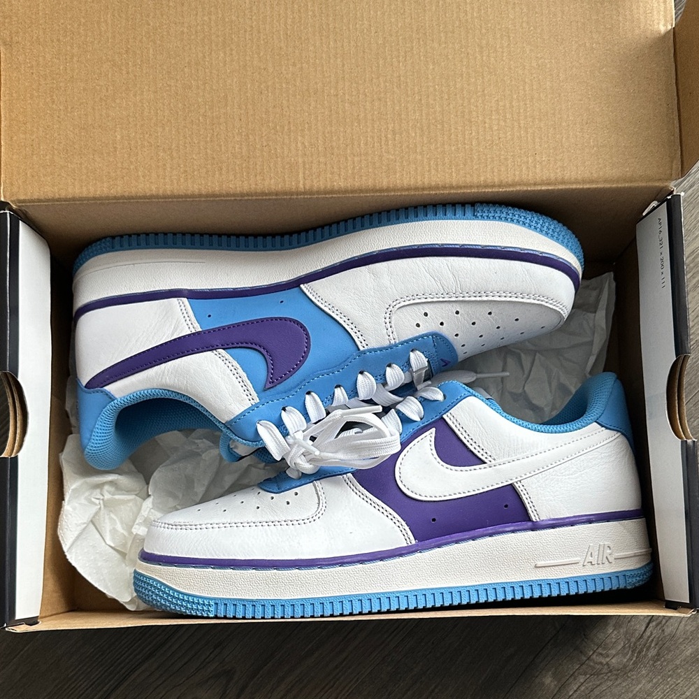 White Air Force 1 Sage Lows. Nike White and Purple Sneakers with Blue Accents